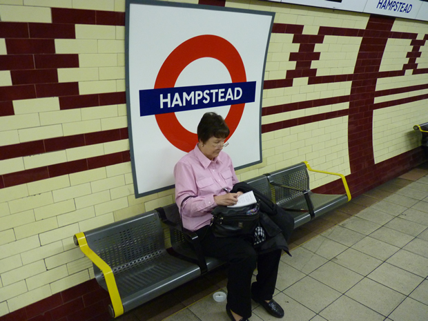 Waiting for the subway at Hampstead Station